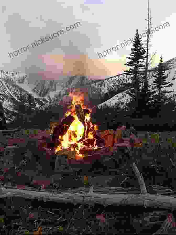 A Hunter Sits By A Campfire In The Wilderness, The Trees And Mountains Surrounding Him. Sidetracks: 40 True Stories Of Hunting And Fishing On Paths Less Traveled (The Sidetracks Series)