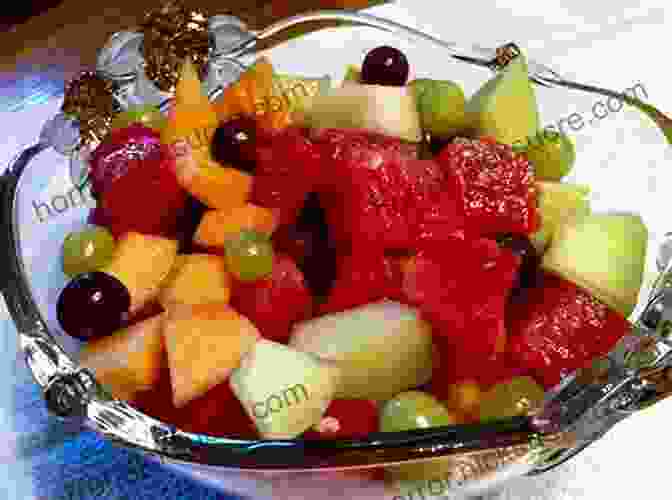 Fruit Salad Made With Fresh Berries, Melon, And Grapes. The Picnic For Family Or Romance: Create Memorable Times Outdoors Plus Favorite Picnic Food Recipes